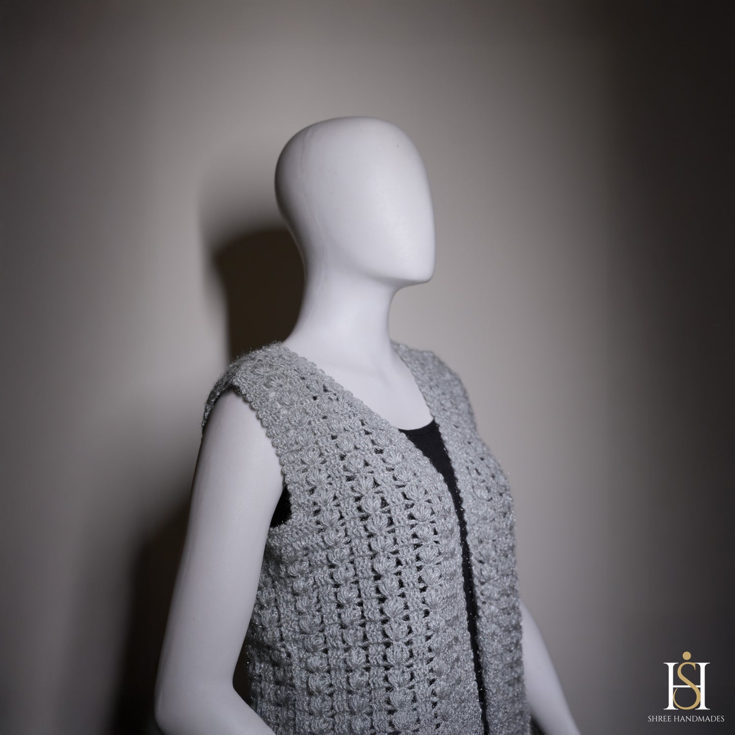 SLEEVELESS CARDIGAN