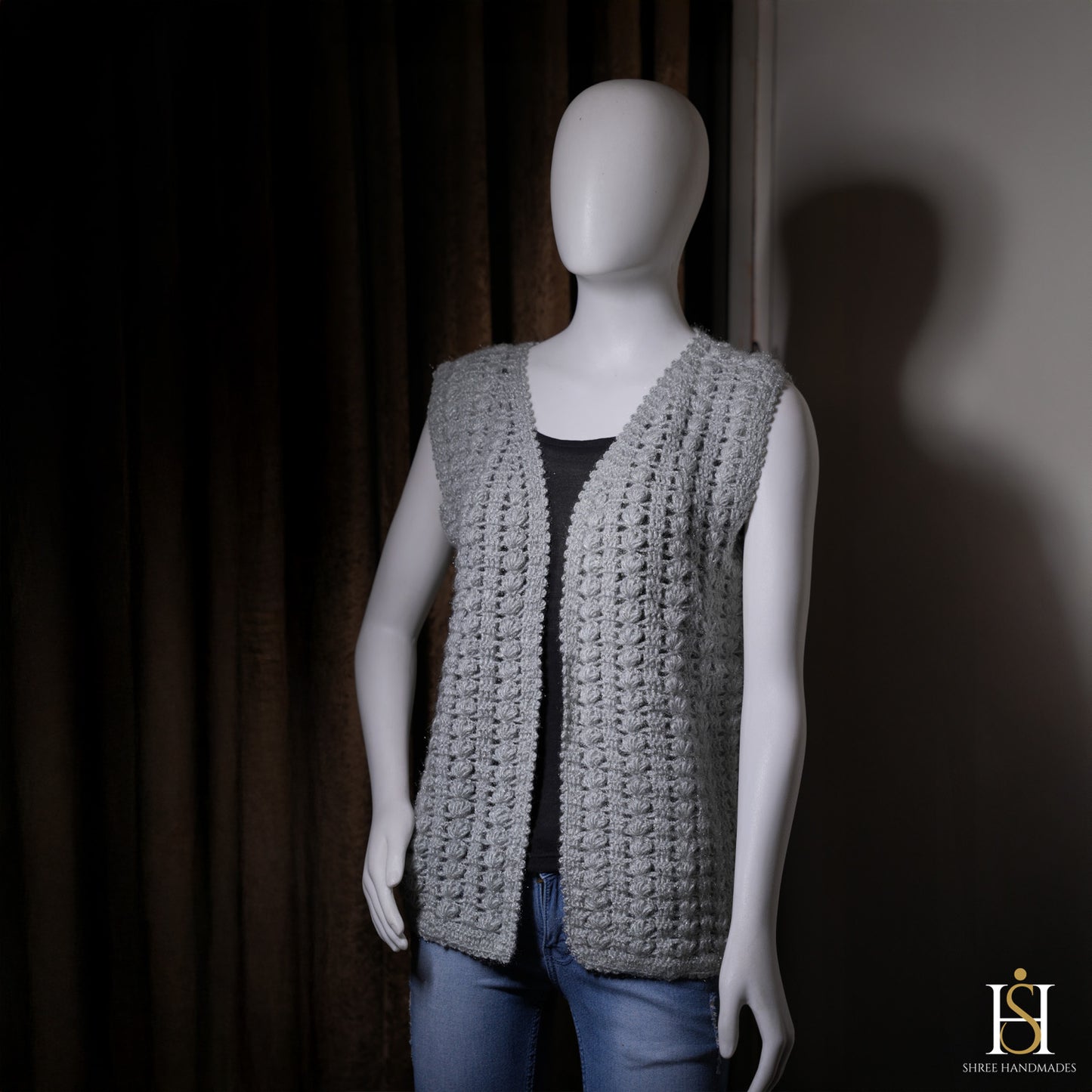 SLEEVELESS CARDIGAN